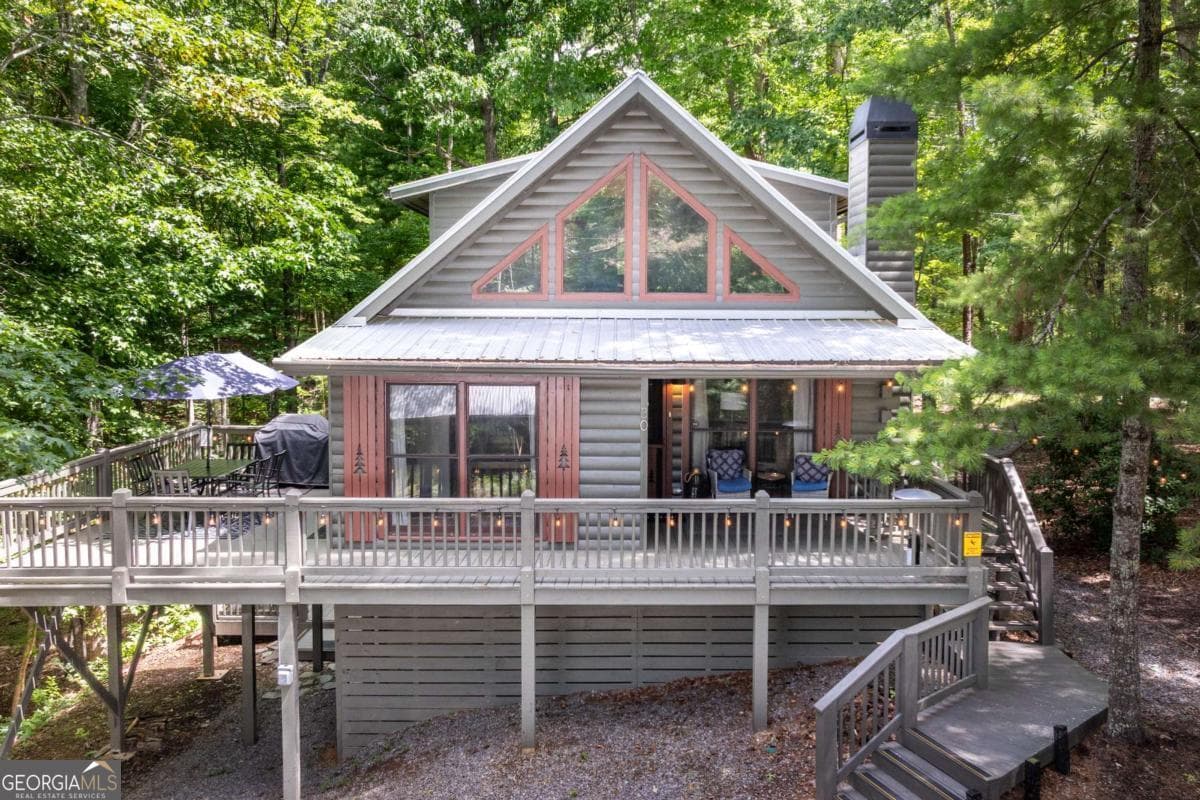 4 bedroom, 2 bathroom, 1,950 sq ft cabin,single family residence for sale at 30 Maxwell Lane 242, Blue Ridge, GA 30513 — photo 3