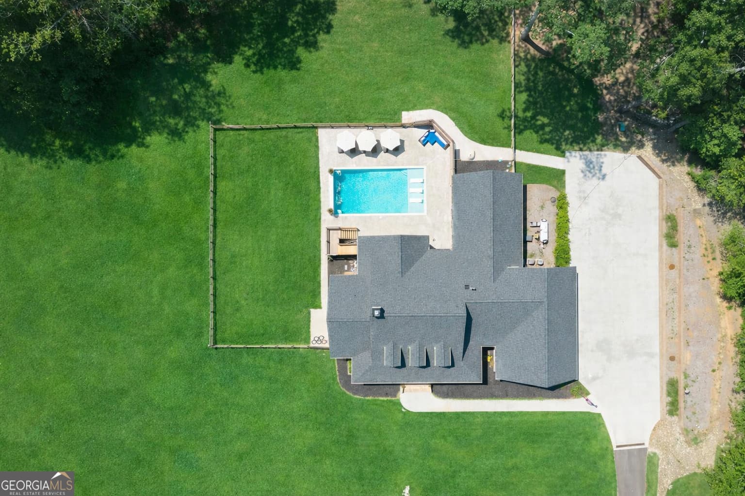 7 bedroom, 5.5 bathroom, 6,399 sq ft single family residence for sale at 1380 Cronic Town Road, Auburn, GA 30011
