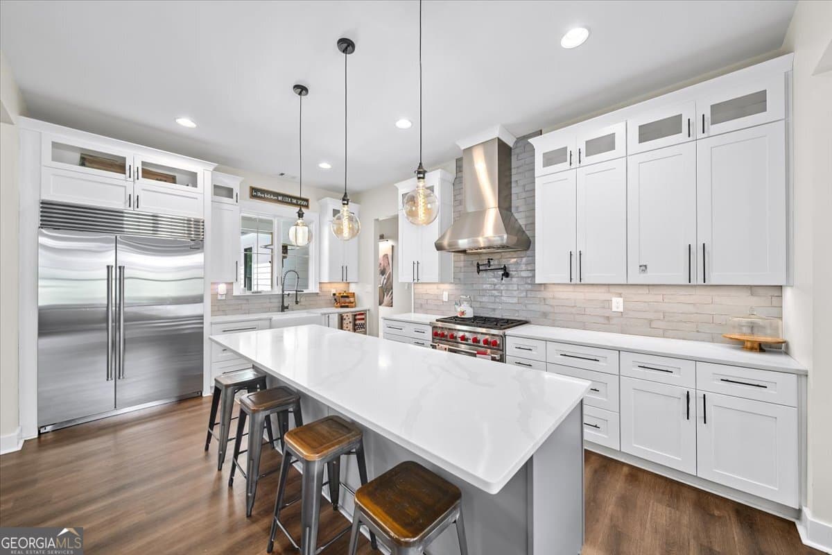 7 bedroom, 5.5 bathroom, 6,399 sq ft single family residence for sale at 1380 Cronic Town Road, Auburn, GA 30011 — photo 4