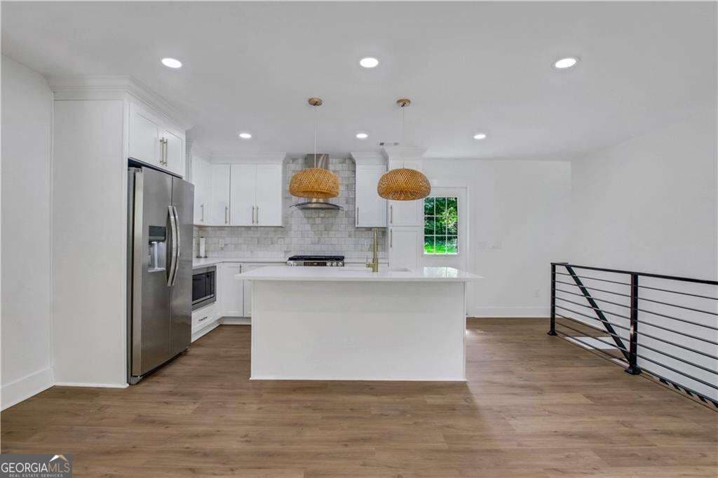 4 bedroom, 3 bathroom single family residence for sale at 1905 Delowe Place, Atlanta, GA 30311 — photo 5