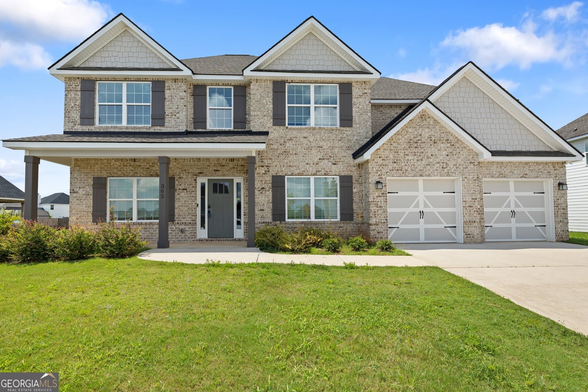 5 bedroom, 4 bathroom, 3,325 sq ft single family residence for sale at 302 Weeping Moss Way, Kathleen, GA 31047 — photo 2