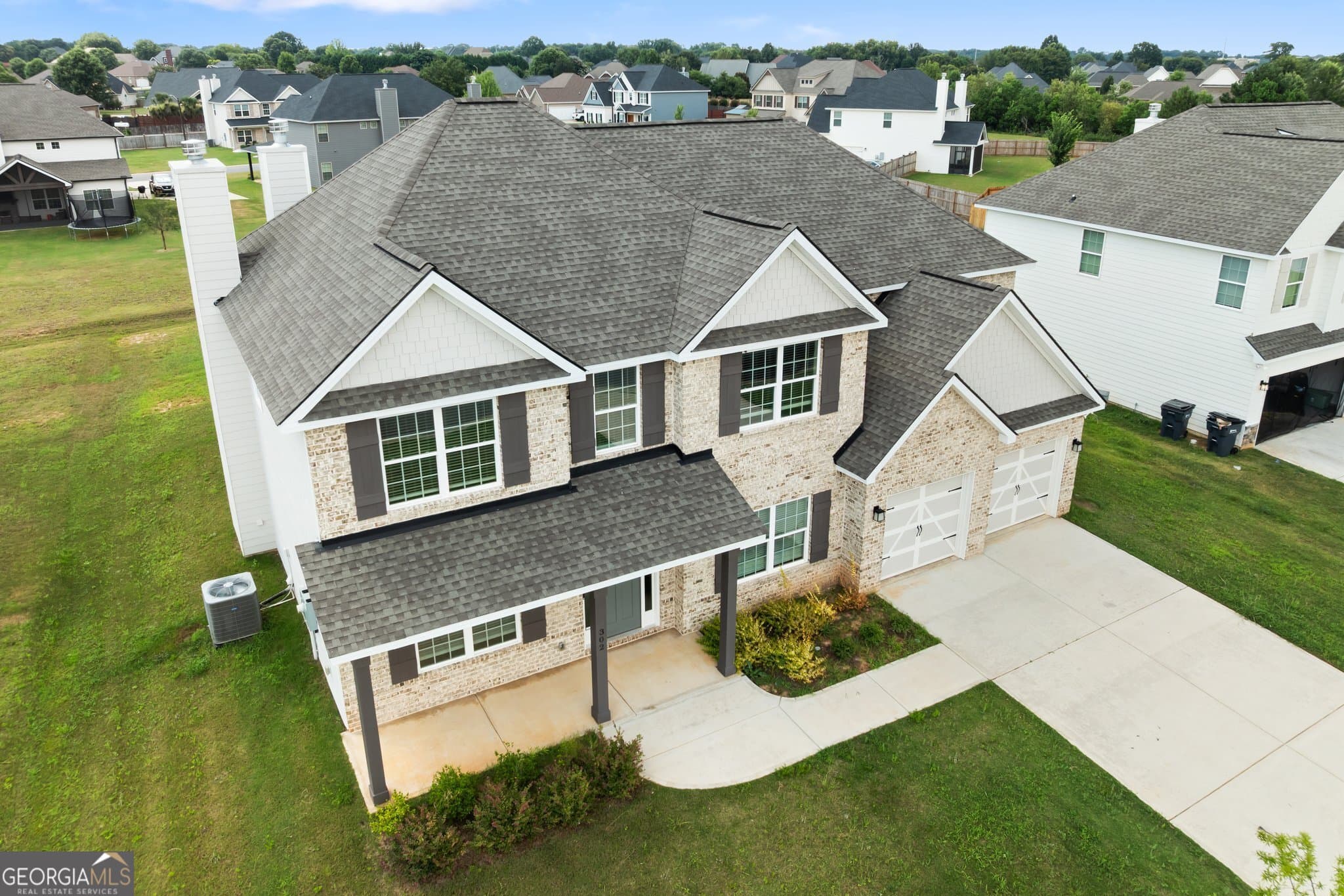 5 bedroom, 4 bathroom, 3,325 sq ft single family residence for sale at 302 Weeping Moss Way, Kathleen, GA 31047 — photo 4