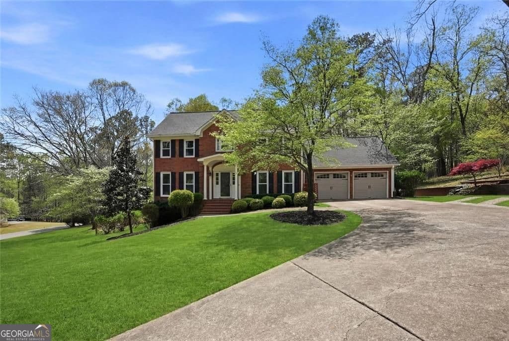 4 bedroom, 2.5 bathroom, 2,815 sq ft single family residence for sale at 104 Crabapple Springs Drive, Woodstock, GA 30188 — photo 2
