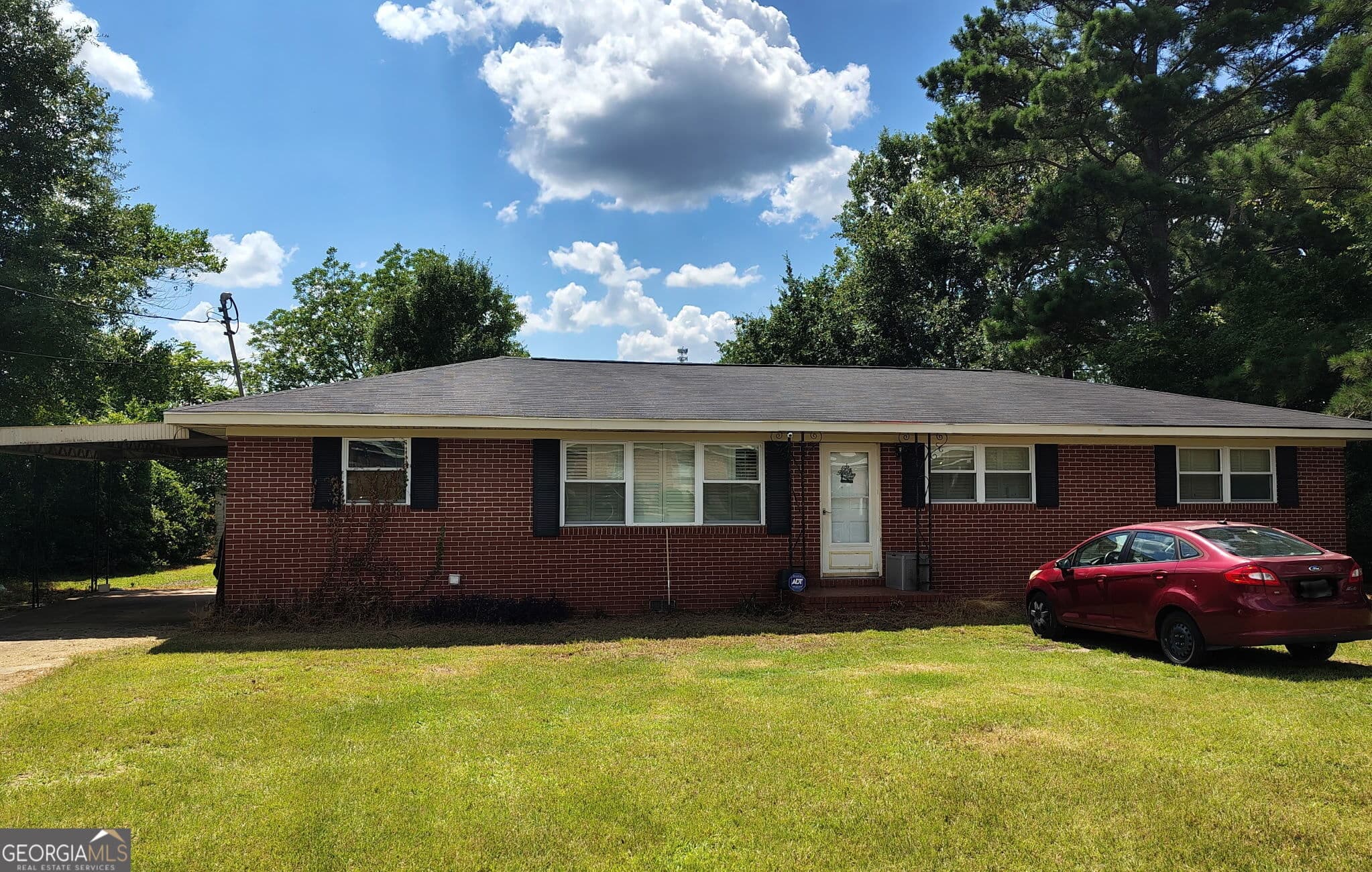 3 bedroom, 2 bathroom, 1,486 sq ft single family residence for sale at 205 Grace Street, Colquitt, GA 39837 — photo 1 of 11