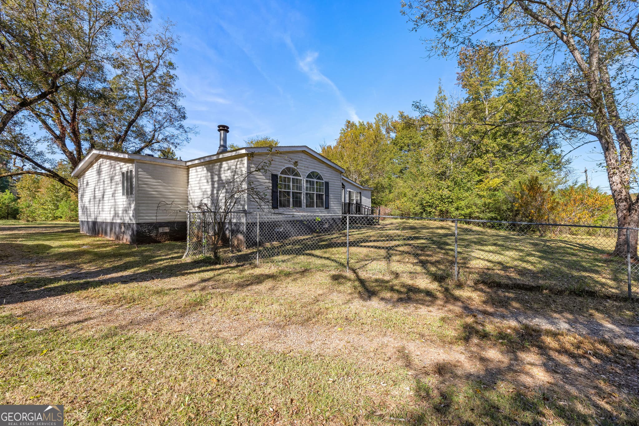 4 bedroom, 2 bathroom, 1,836 sq ft manufactured home,single family residence for sale at 1394 Trice Cemetery Road, Thomaston, GA 30286 — photo 2