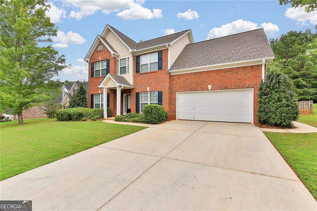 4 bedroom, 2.5 bathroom, 2,315 sq ft single family residence for sale at 893 Port West Drive, Auburn, GA 30011 — photo 2