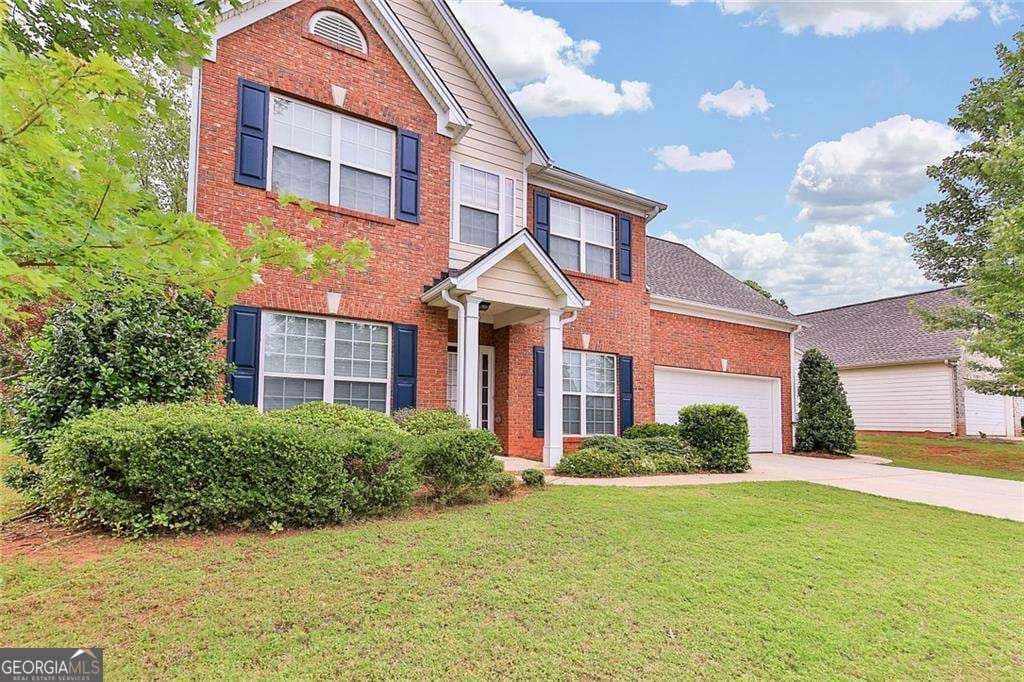 4 bedroom, 2.5 bathroom, 2,315 sq ft single family residence for sale at 893 Port West Drive, Auburn, GA 30011 — photo 3