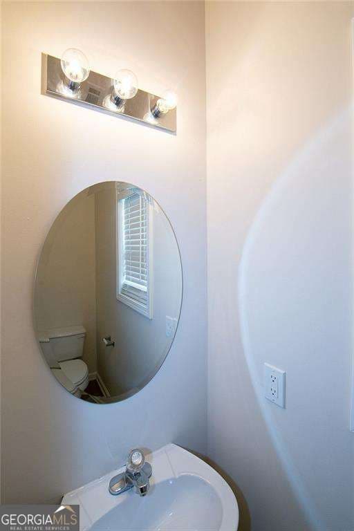 4 bedroom, 2.5 bathroom, 2,315 sq ft single family residence for sale at 893 Port West Drive, Auburn, GA 30011 — photo 10