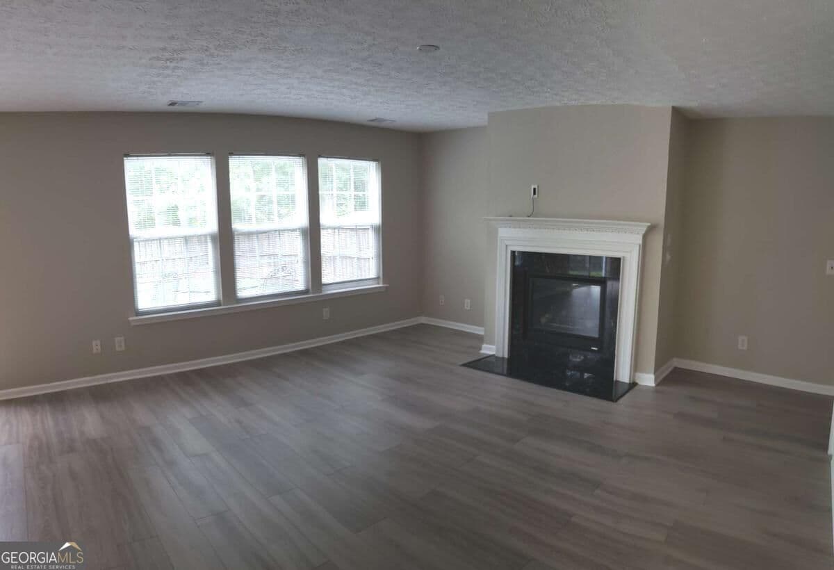 4 bedroom, 2.5 bathroom, 2,228 sq ft single family residence for rent at 204 Wild Flower Lane, Canton, GA 30114 for $2,400 a month — photo 4