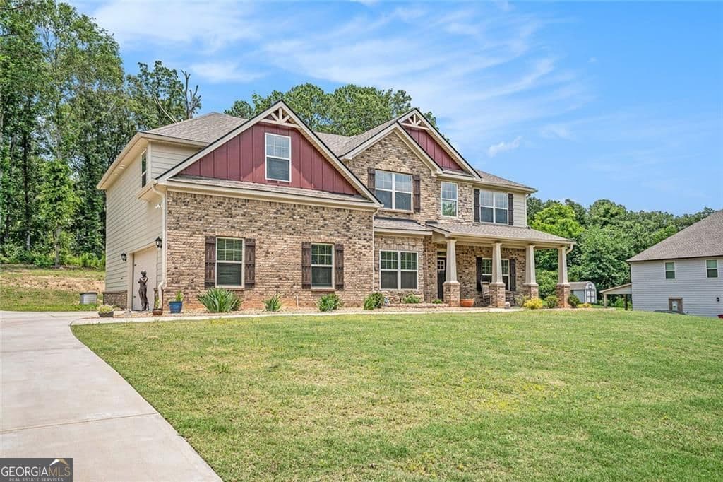 5 bedroom, 4 bathroom, 3,532 sq ft single family residence for sale at 381 Homestead Circle, Forsyth, GA 31029 — photo 4