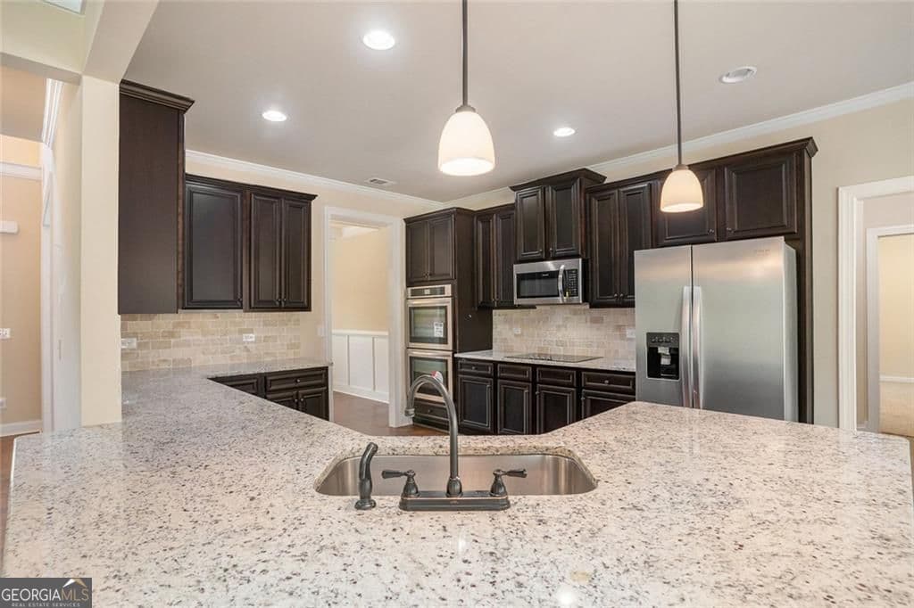 5 bedroom, 4 bathroom, 3,532 sq ft single family residence for sale at 381 Homestead Circle, Forsyth, GA 31029 — photo 8