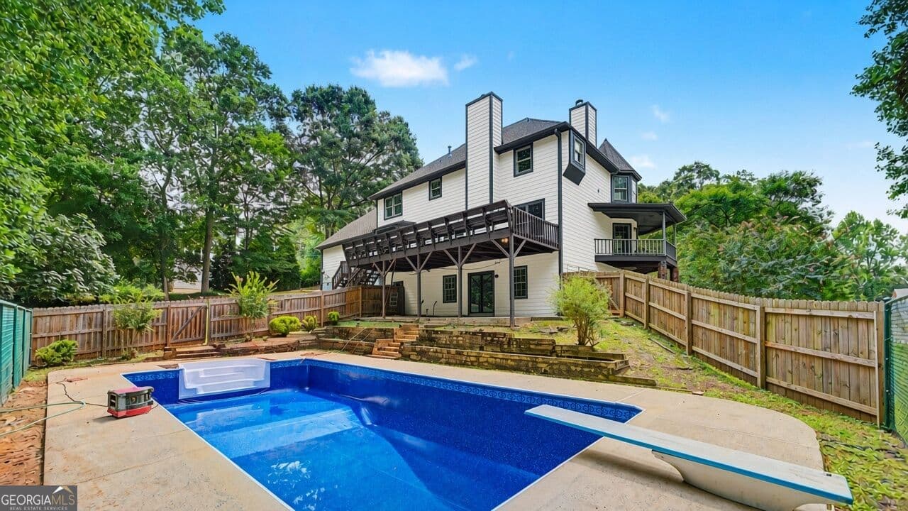 5 bedroom, 4.5 bathroom, 5,600 sq ft single family residence for sale at 228 Nacoochee Drive, Woodstock, GA 30188 — photo 2