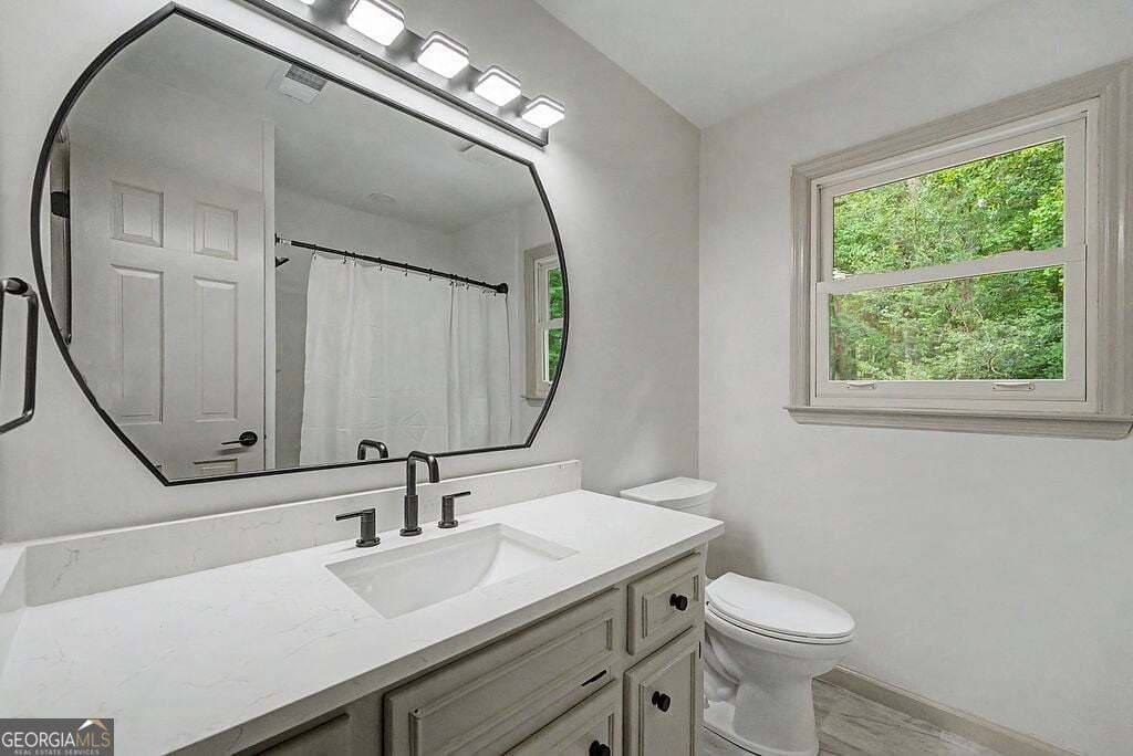 5 bedroom, 4.5 bathroom, 5,600 sq ft single family residence for sale at 228 Nacoochee Drive, Woodstock, GA 30188 — photo 7