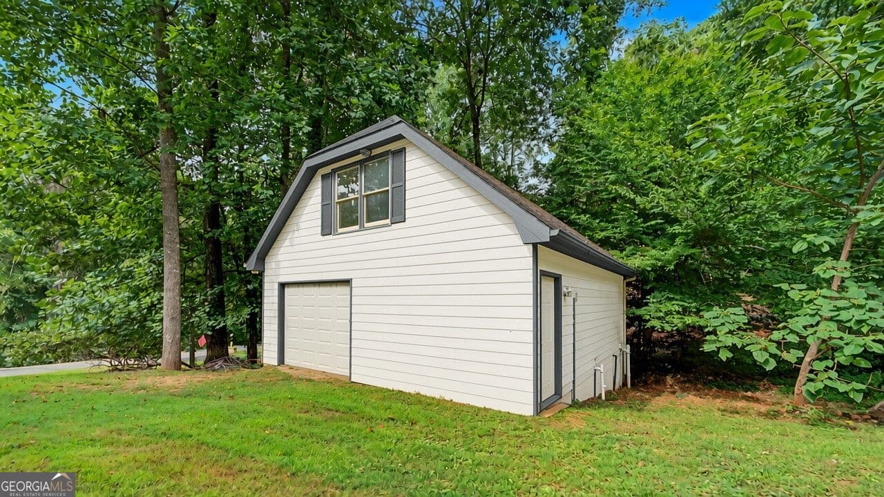 5 bedroom, 4.5 bathroom, 5,600 sq ft single family residence for sale at 228 Nacoochee Drive, Woodstock, GA 30188 — photo 8