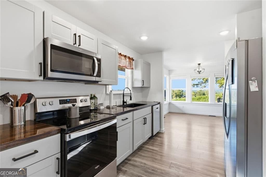 2 bedroom, 2.5 bathroom, 1,288 sq ft single family residence for sale at 1075 Four Mile Church Road, Ball Ground, GA 30107 — photo 4