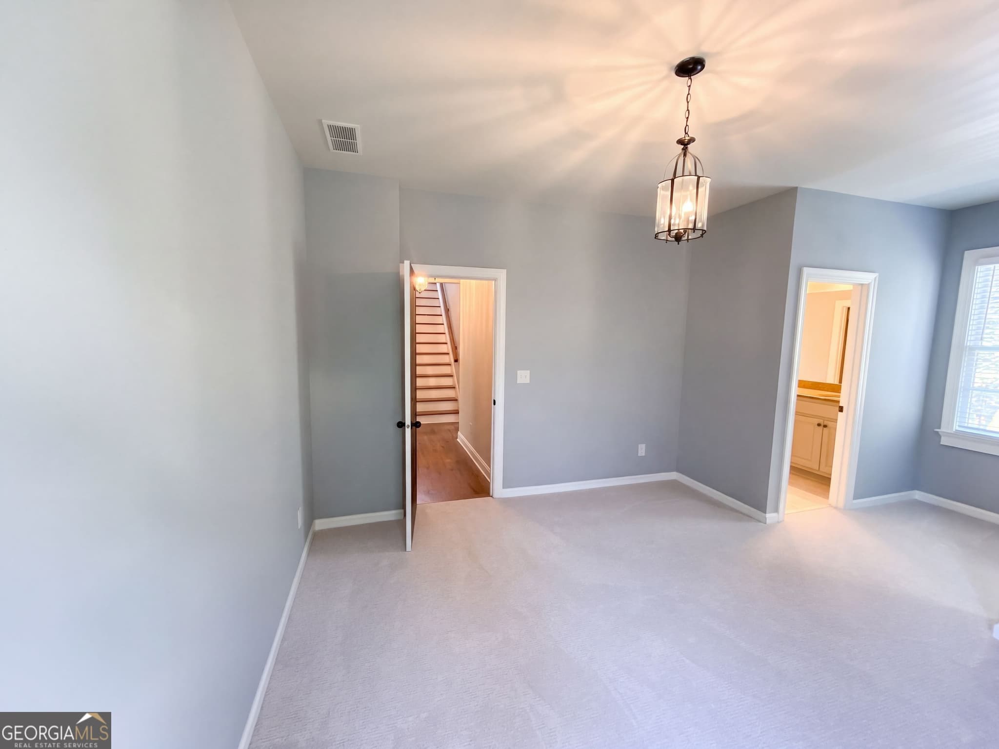 4 bedroom, 5 bathroom, 5,016 sq ft single family residence for sale at 1119 Ridenour Court, Kennesaw, GA 30152 — photo 4