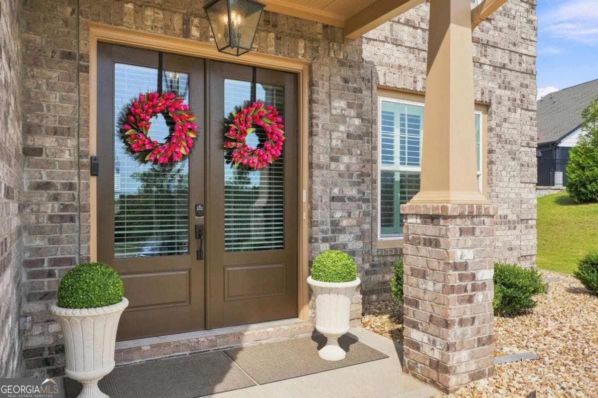 5 bedroom, 3.5 bathroom, 4,370 sq ft single family residence for sale at 1604 Falcon Court, Locust Grove, GA 30248 — photo 2