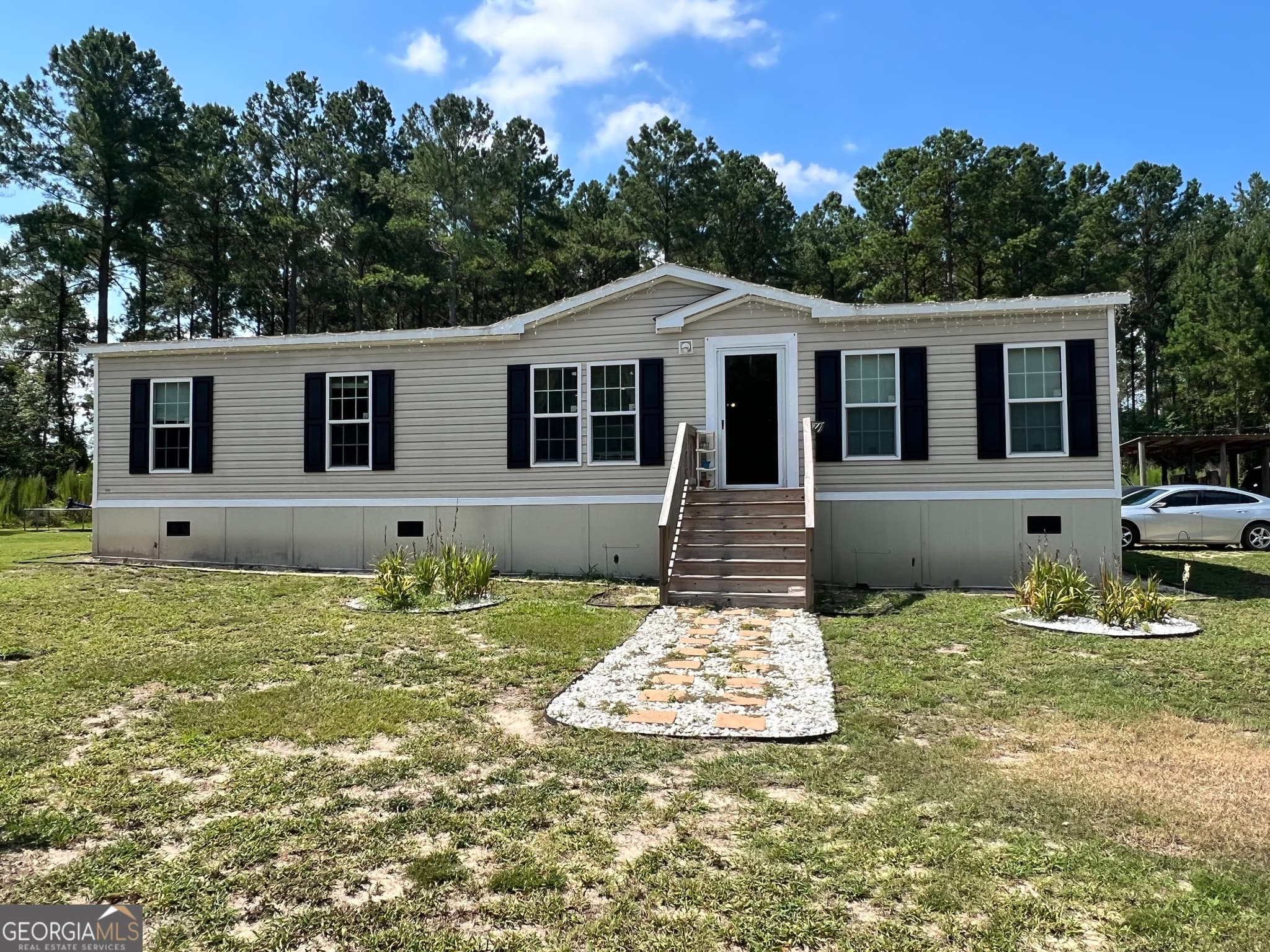 4 bedroom, 2 bathroom, 1,664 sq ft manufactured home,single family residence sold at 910 George Strickland Road, Claxton, GA 30417