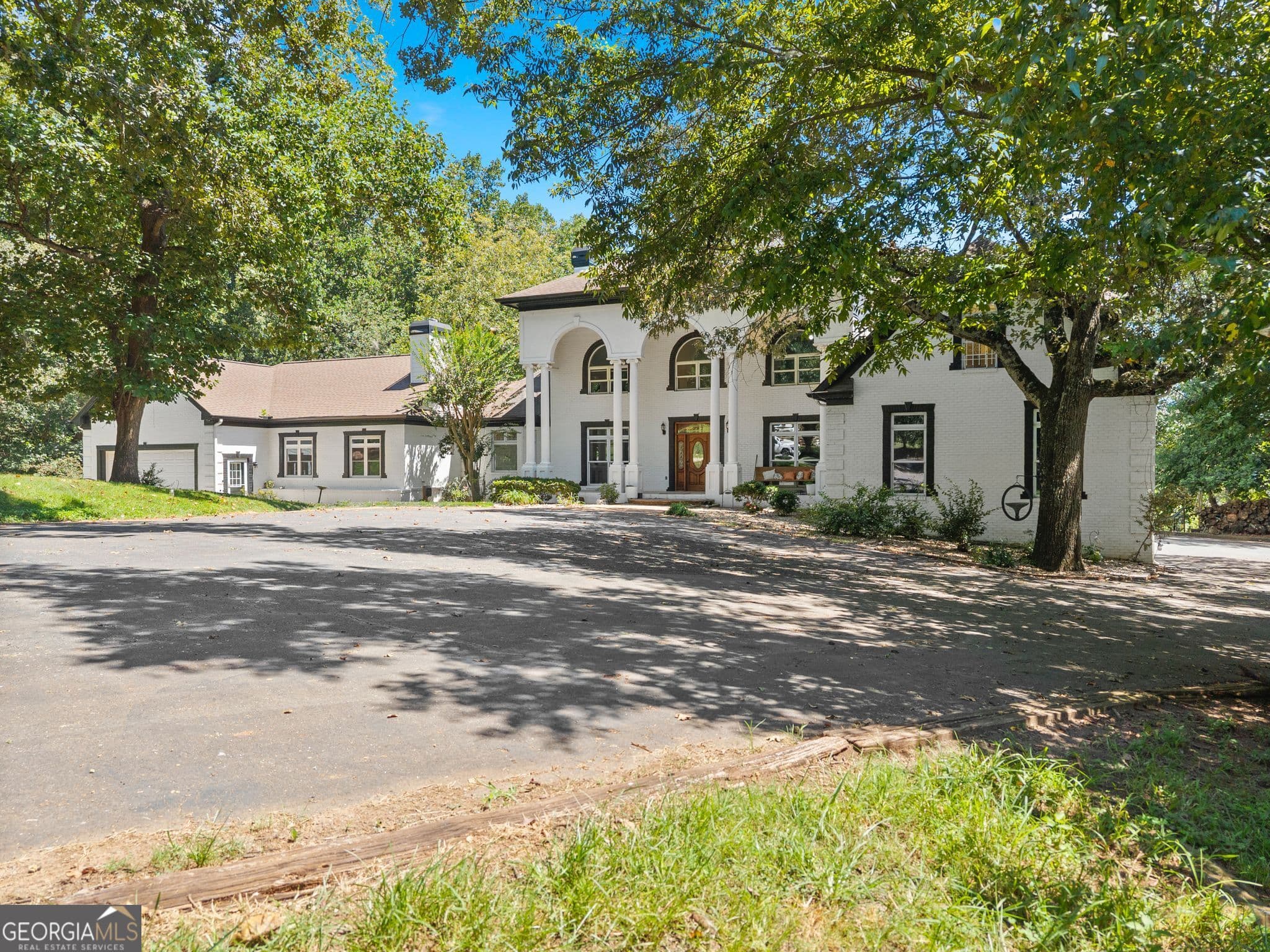 7 bedroom, 7 bathroom, 7,481 sq ft single family residence for sale at 8080 Milford Road, Gainesville, GA 30506 — photo 2