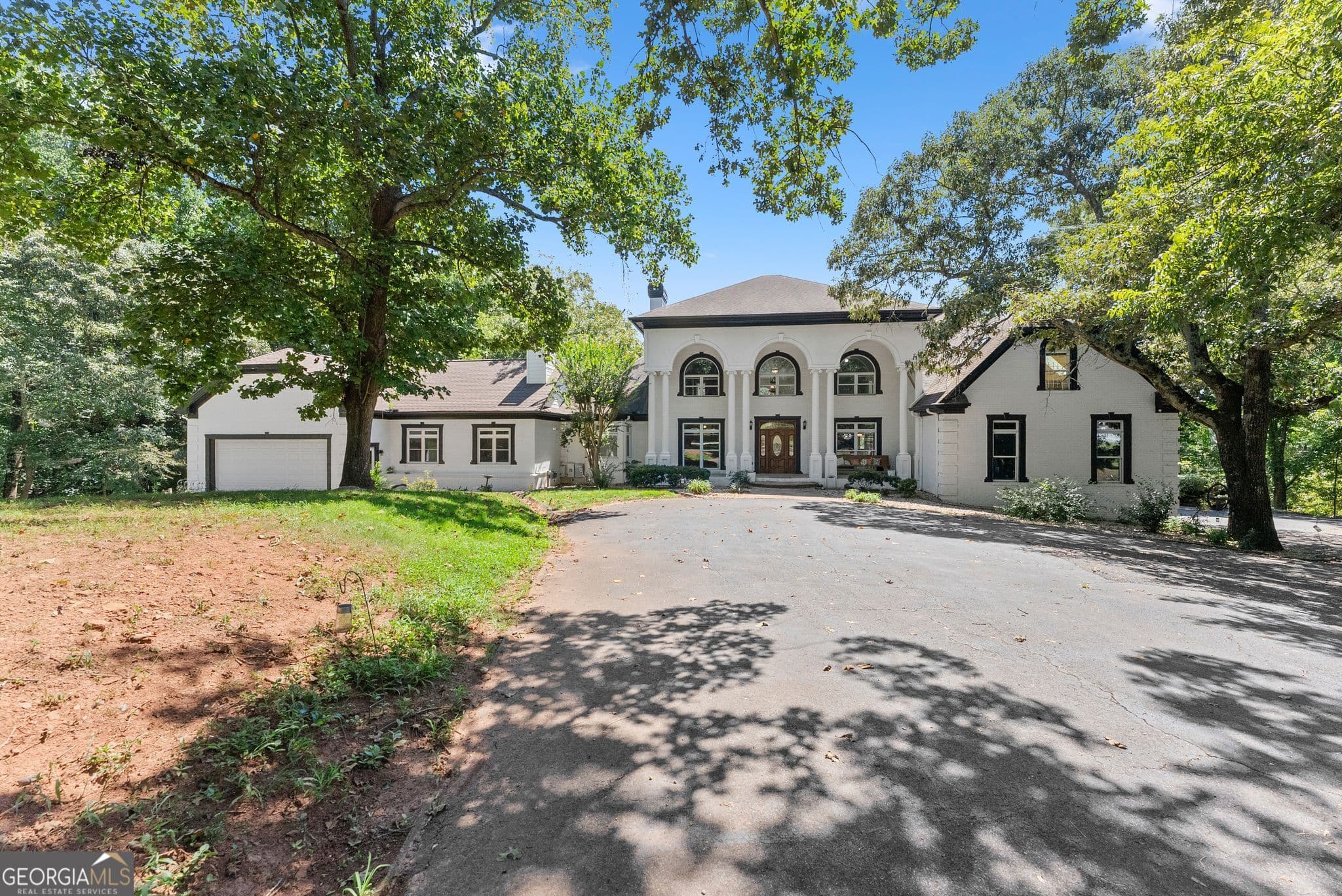 7 bedroom, 7 bathroom, 7,481 sq ft single family residence for sale at 8080 Milford Road, Gainesville, GA 30506
