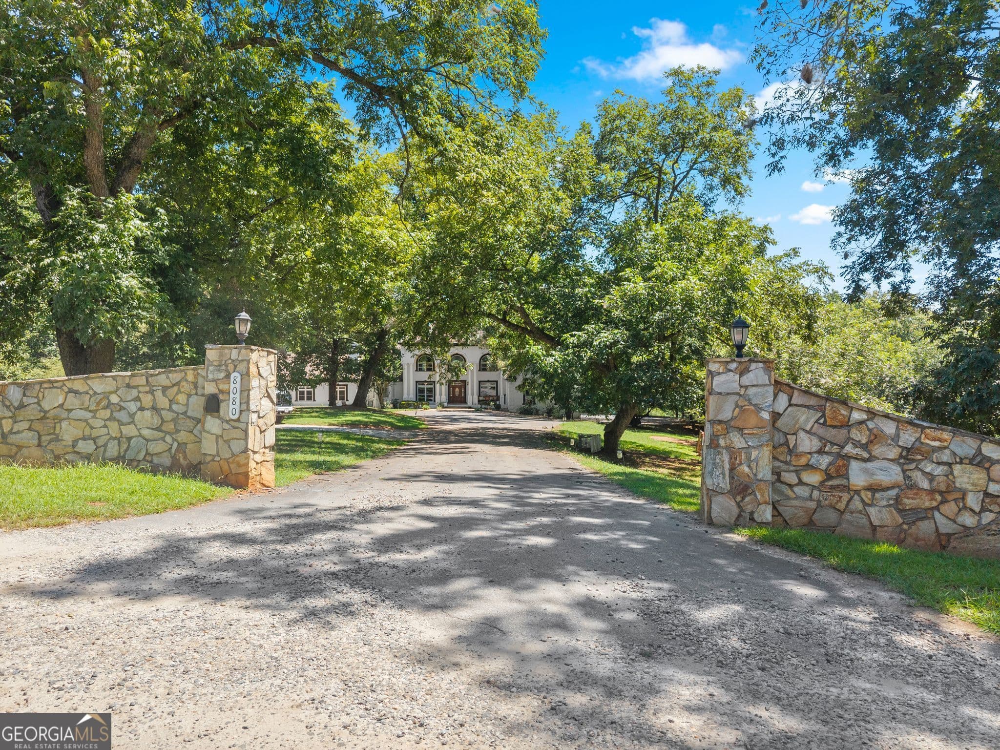 7 bedroom, 7 bathroom, 7,481 sq ft single family residence for sale at 8080 Milford Road, Gainesville, GA 30506 — photo 4