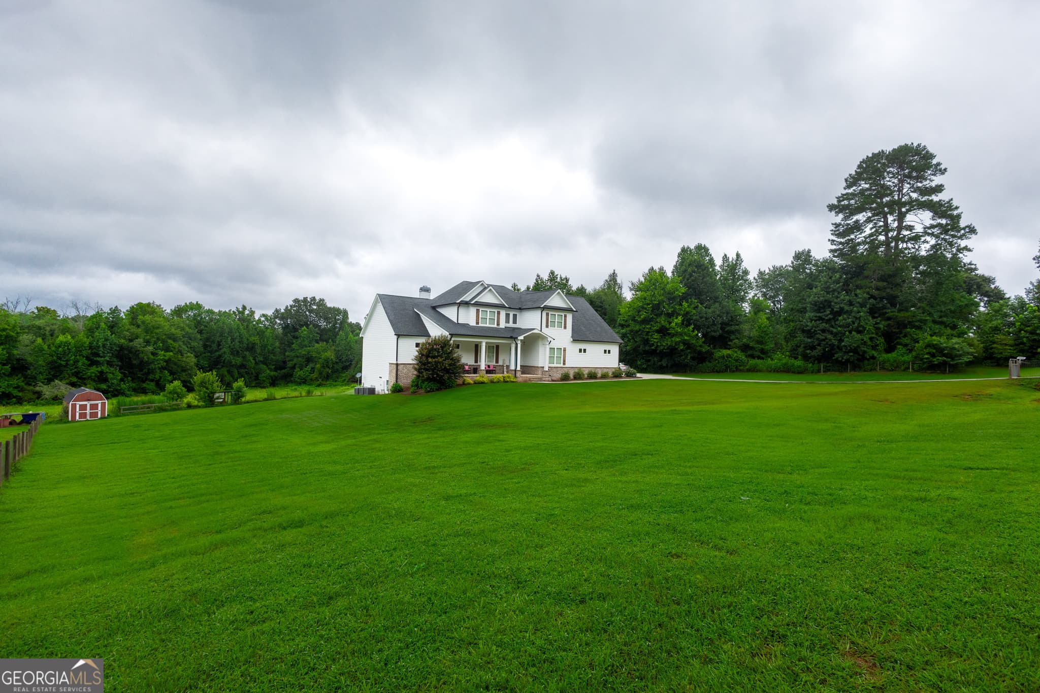 6 bedroom, 5.5 bathroom, 5,784 sq ft single family residence for sale at 1440 Chandler Bridge Road, Nicholson, GA 30565 — photo 4