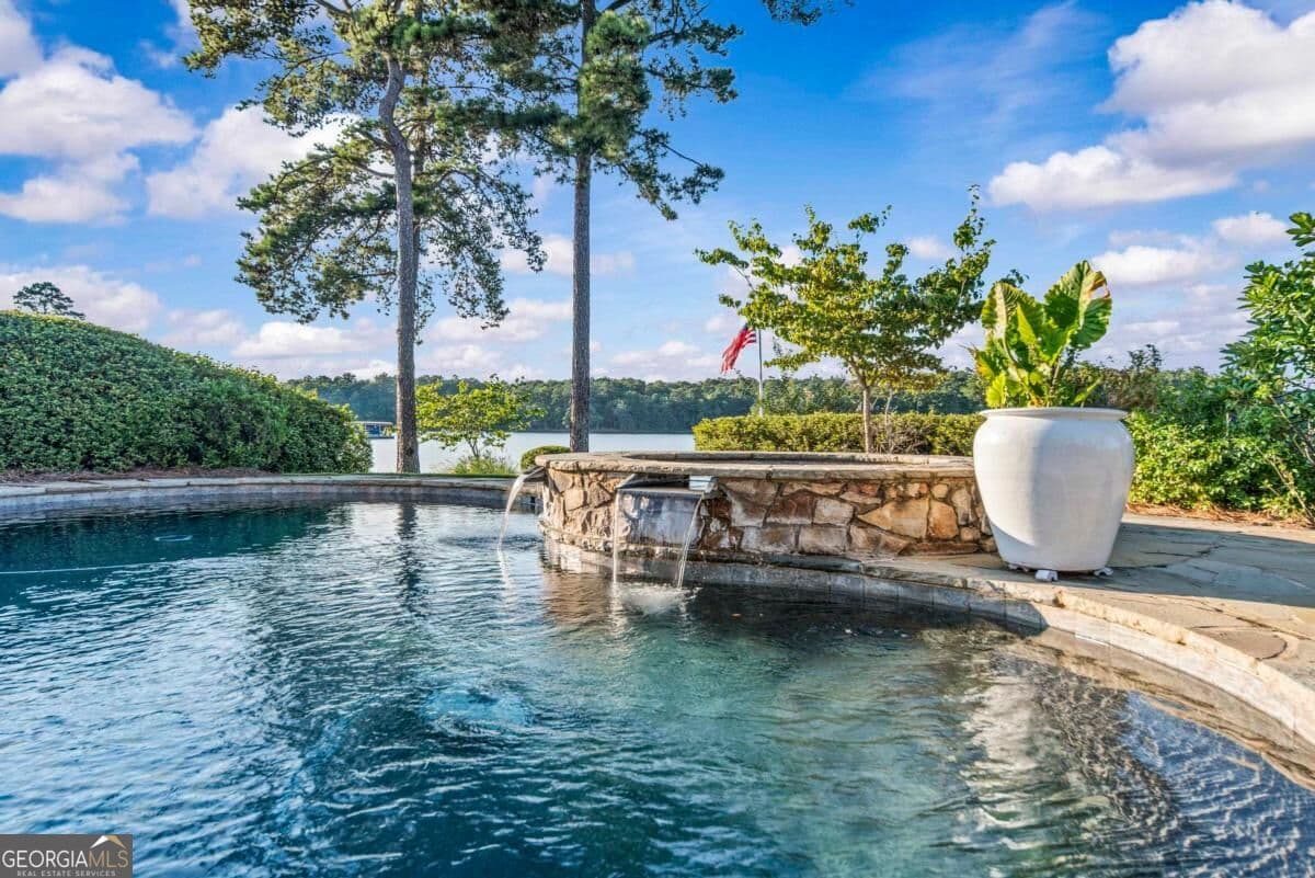 5 bedroom, 5.5 bathroom, 5,086 sq ft single family residence for sale at 1370 Rose Creek, Greensboro, GA 30642 — photo 4