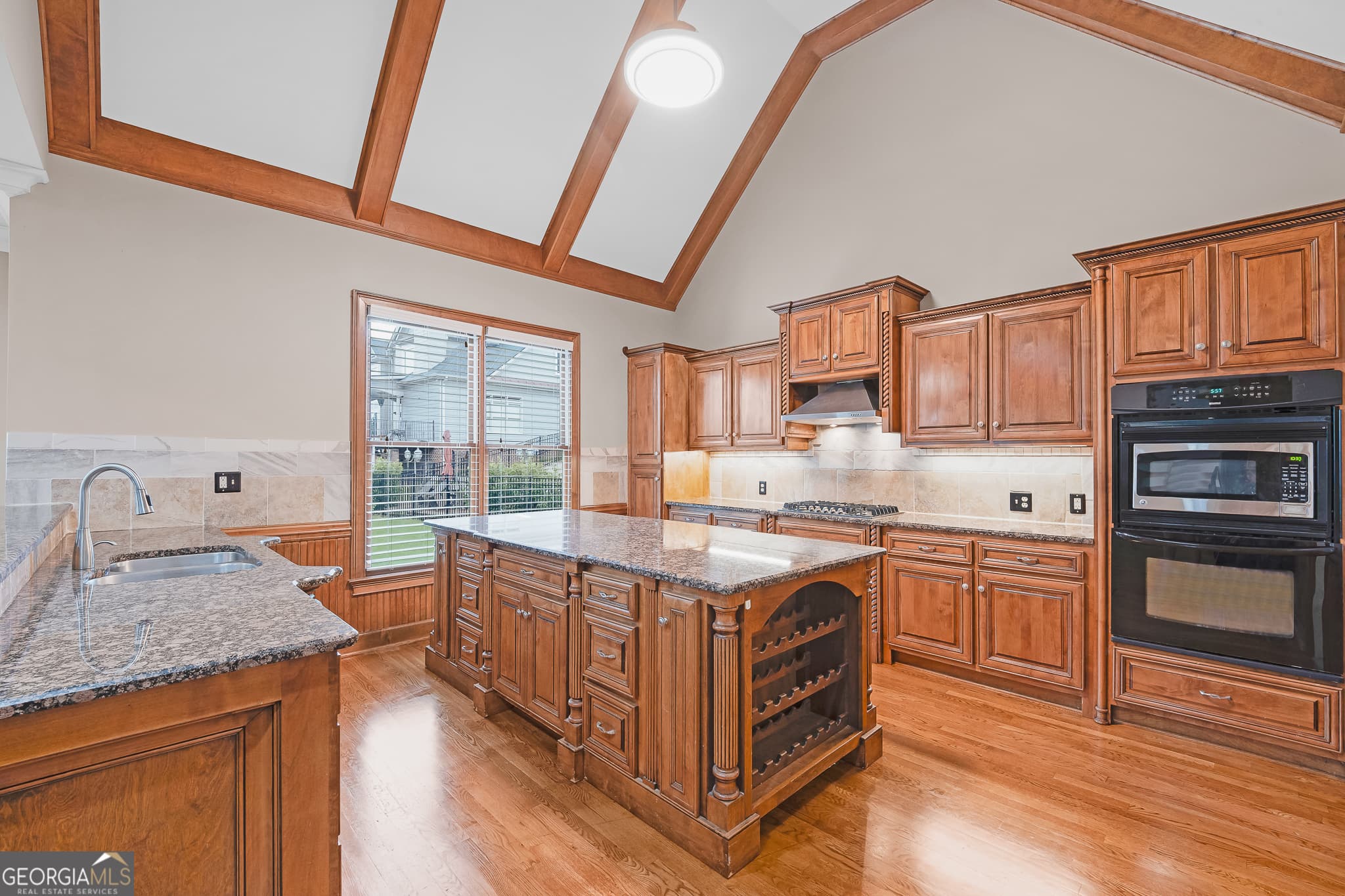 6 bedroom, 5.5 bathroom, 6,489 sq ft single family residence for sale at 2552 Stone Manor Drive, Buford, GA 30519 — photo 9