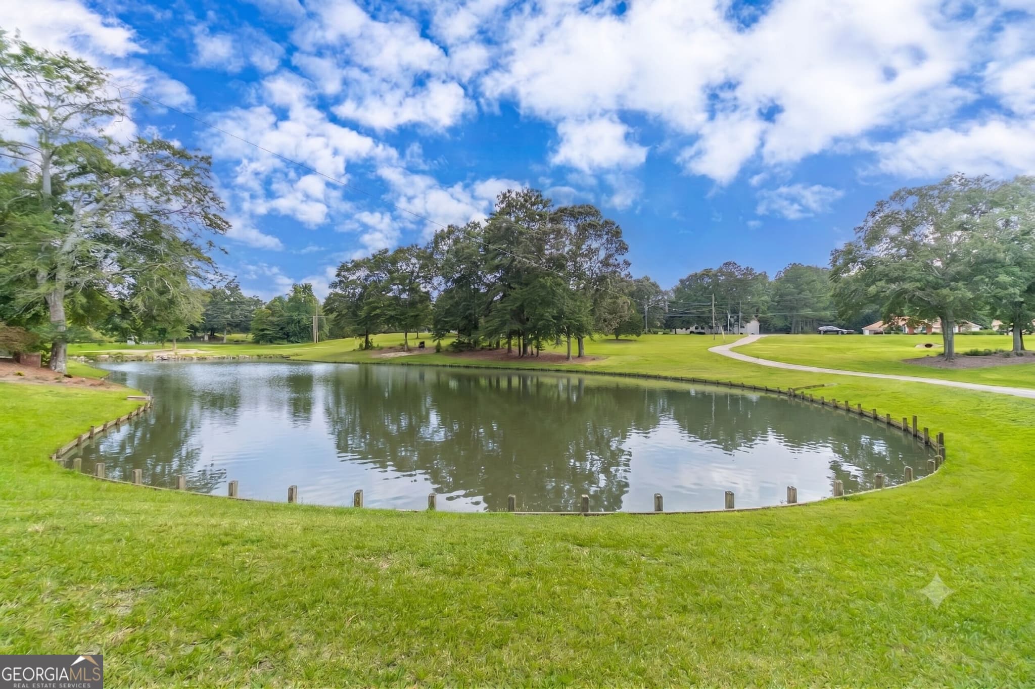 4 bedroom, 4.5 bathroom, 5,071 sq ft single family residence for sale at 1601 Broadnax Mill Road, Loganville, GA 30052 — photo 4