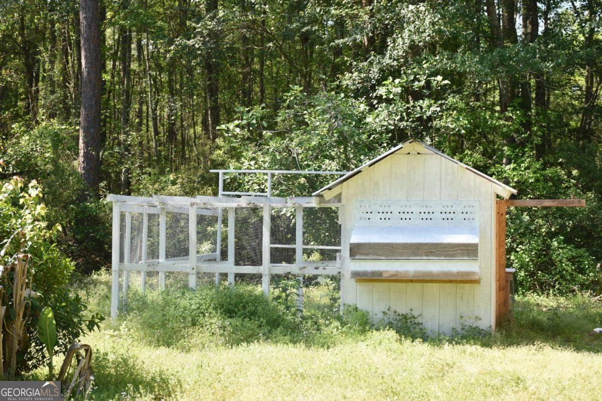 3 bedroom, 2 bathroom, 1,560 sq ft manufactured home,single family residence for sale at 2607 Cecil Nobles Highway, Ludowici, GA 31316 — photo 4