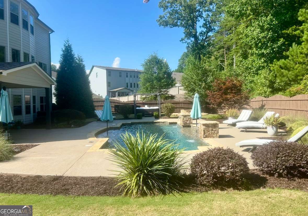 6 bedroom, 4 bathroom, 4,900 sq ft single family residence for sale at 41 Lake Sydney Drive, Dawsonville, GA 30534 — photo 6