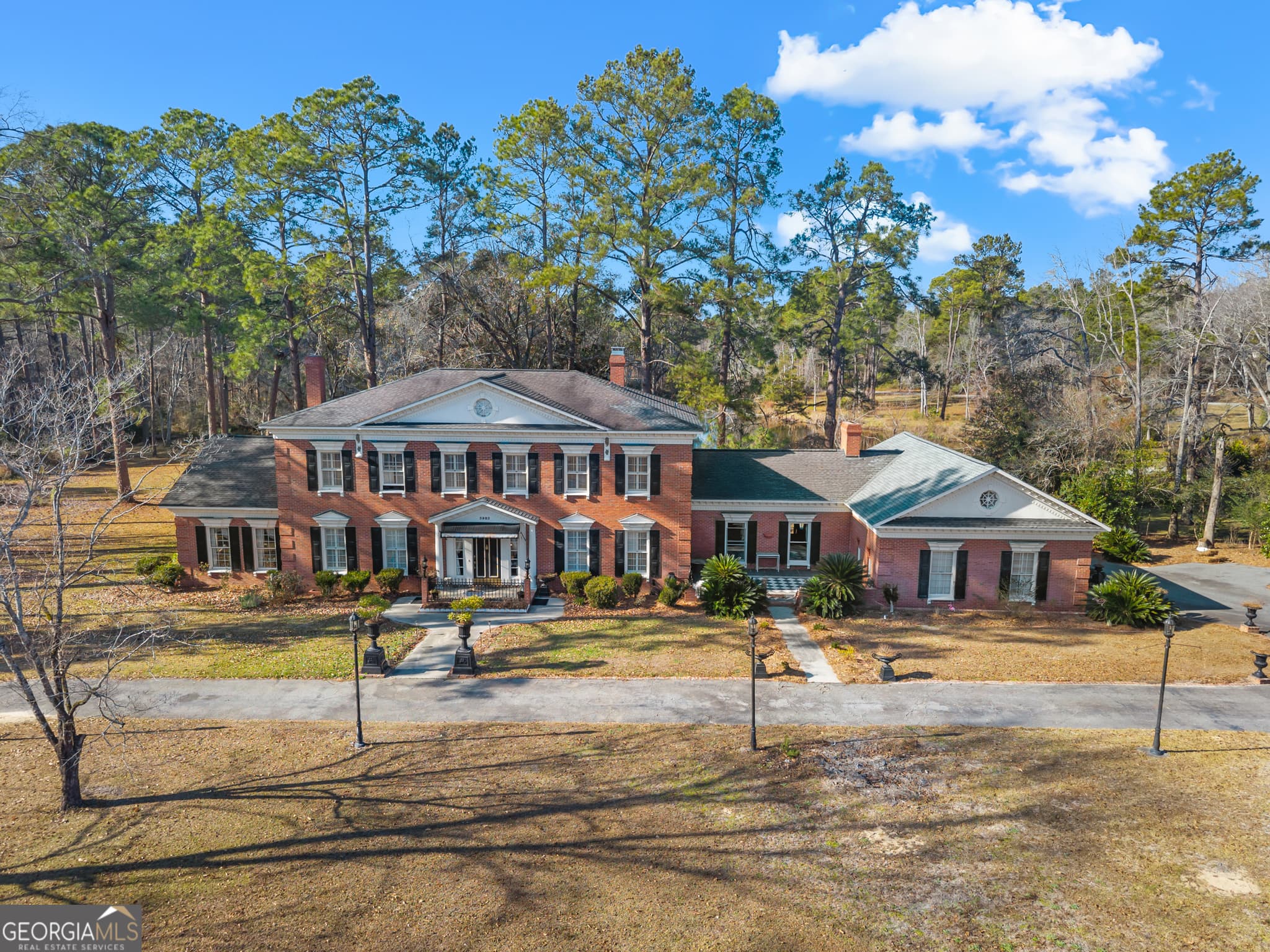 4 bedroom, 4.5 bathroom, 5,368 sq ft single family residence for sale at 3983 Country Club Road, Statesboro, GA 30458 — photo 1 of 46
