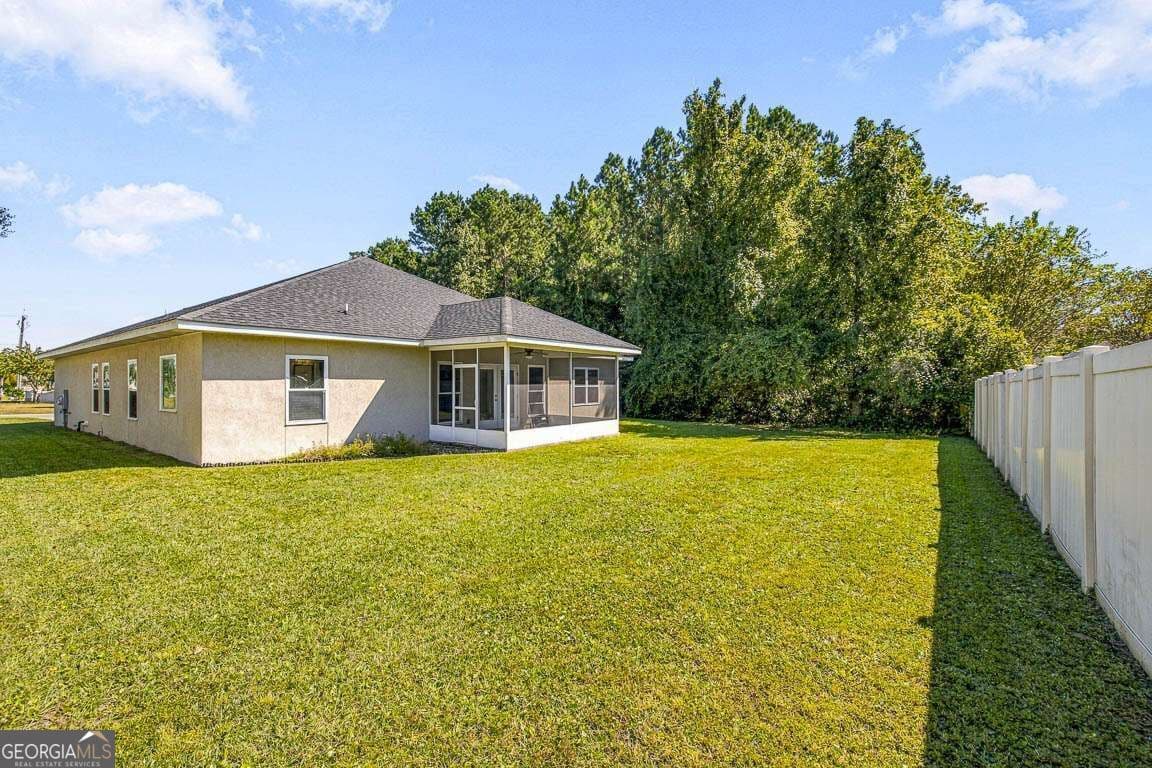 4 bedroom, 2 bathroom, 2,188 sq ft single family residence for sale at 15 Landings Road, Brunswick, GA 31525 — photo 2