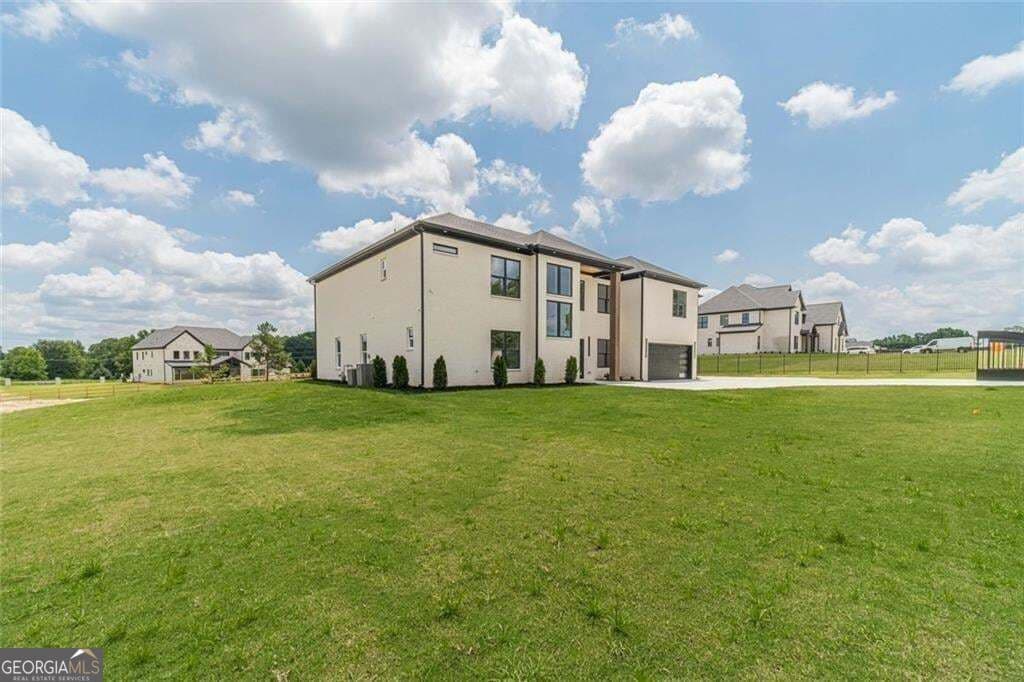 5 bedroom, 5.5 bathroom, 5,664 sq ft single family residence for sale at 3579 New Hope Road, Dacula, GA 30019 — photo 4