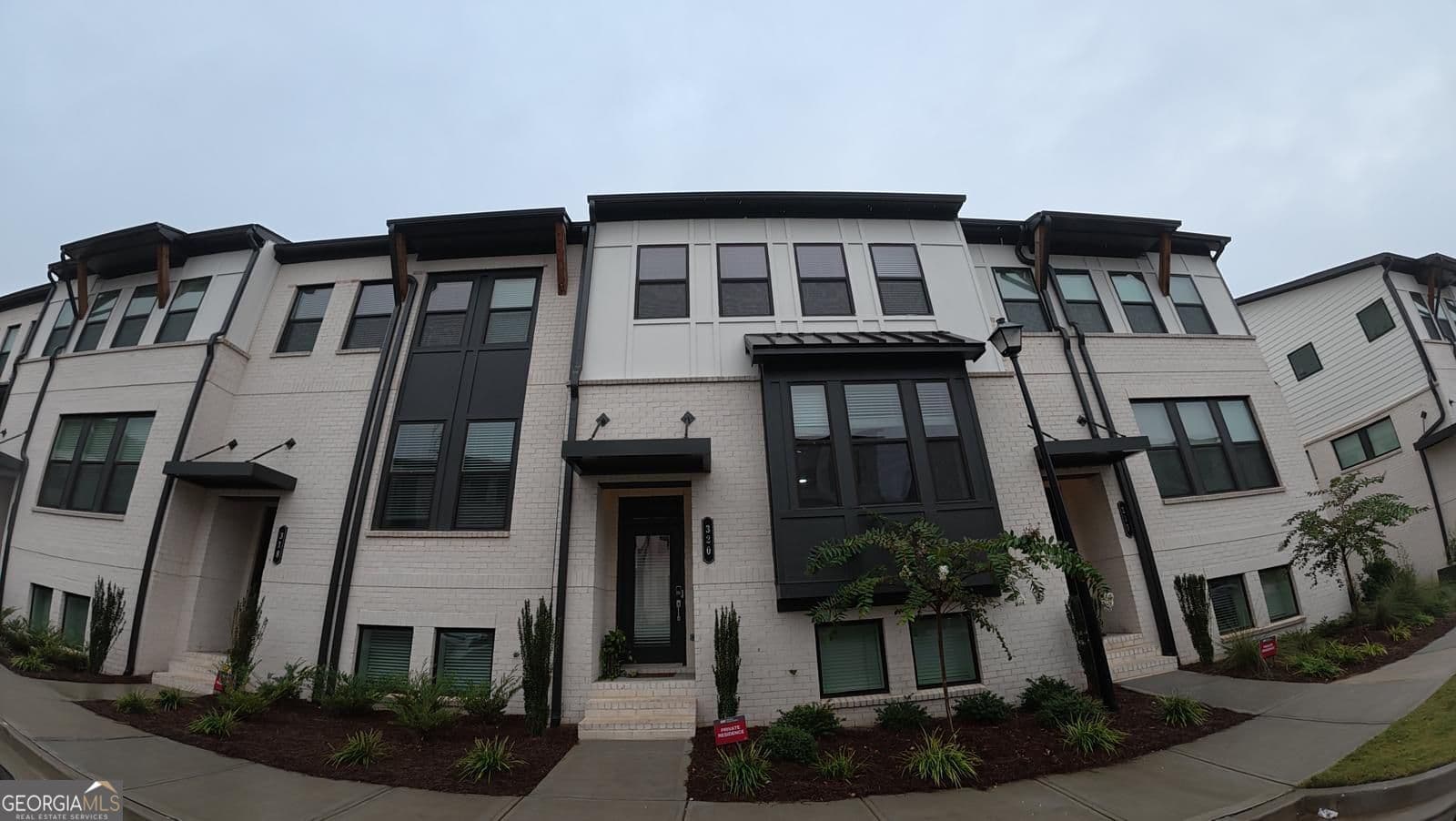 4 bedroom, 3.5 bathroom townhouse for sale at 320 Cornett Way, Lawrenceville, GA 30046