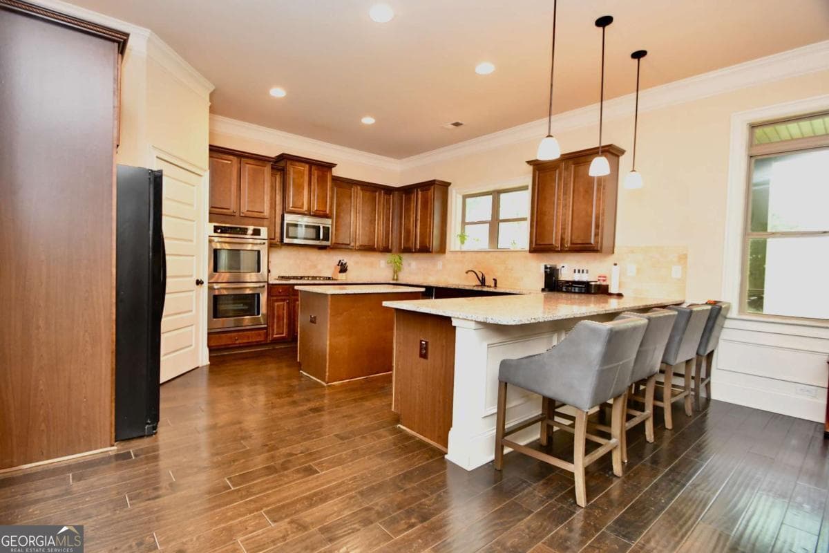 4 bedroom, 2.5 bathroom, 3,846 sq ft single family residence for sale at 1140 Riverhill Drive, Bishop, GA 30621 — photo 6
