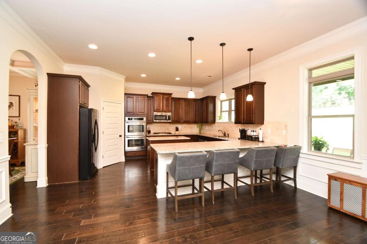 4 bedroom, 2.5 bathroom, 3,846 sq ft single family residence for sale at 1140 Riverhill Drive, Bishop, GA 30621 — photo 7