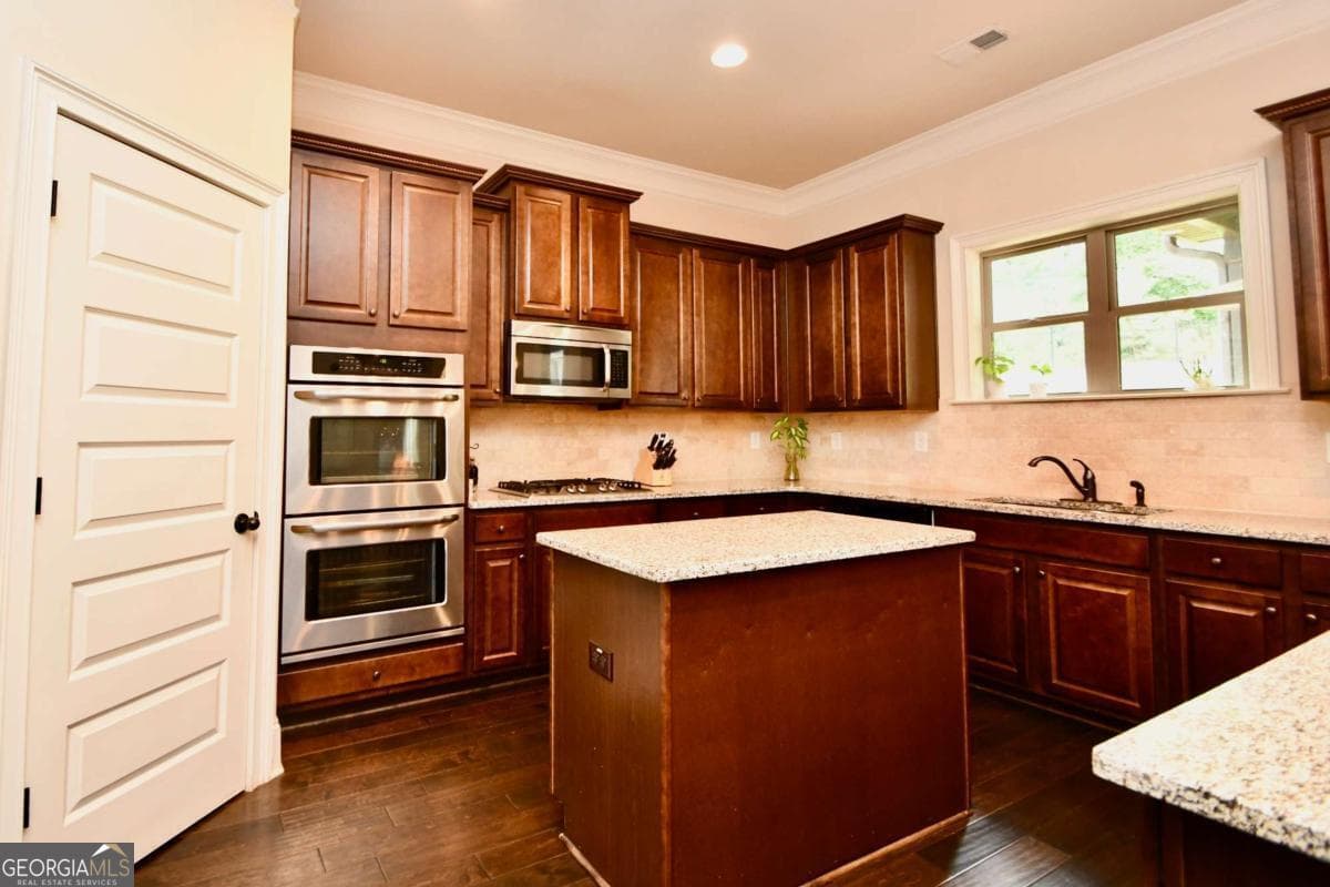 4 bedroom, 2.5 bathroom, 3,846 sq ft single family residence for sale at 1140 Riverhill Drive, Bishop, GA 30621 — photo 9