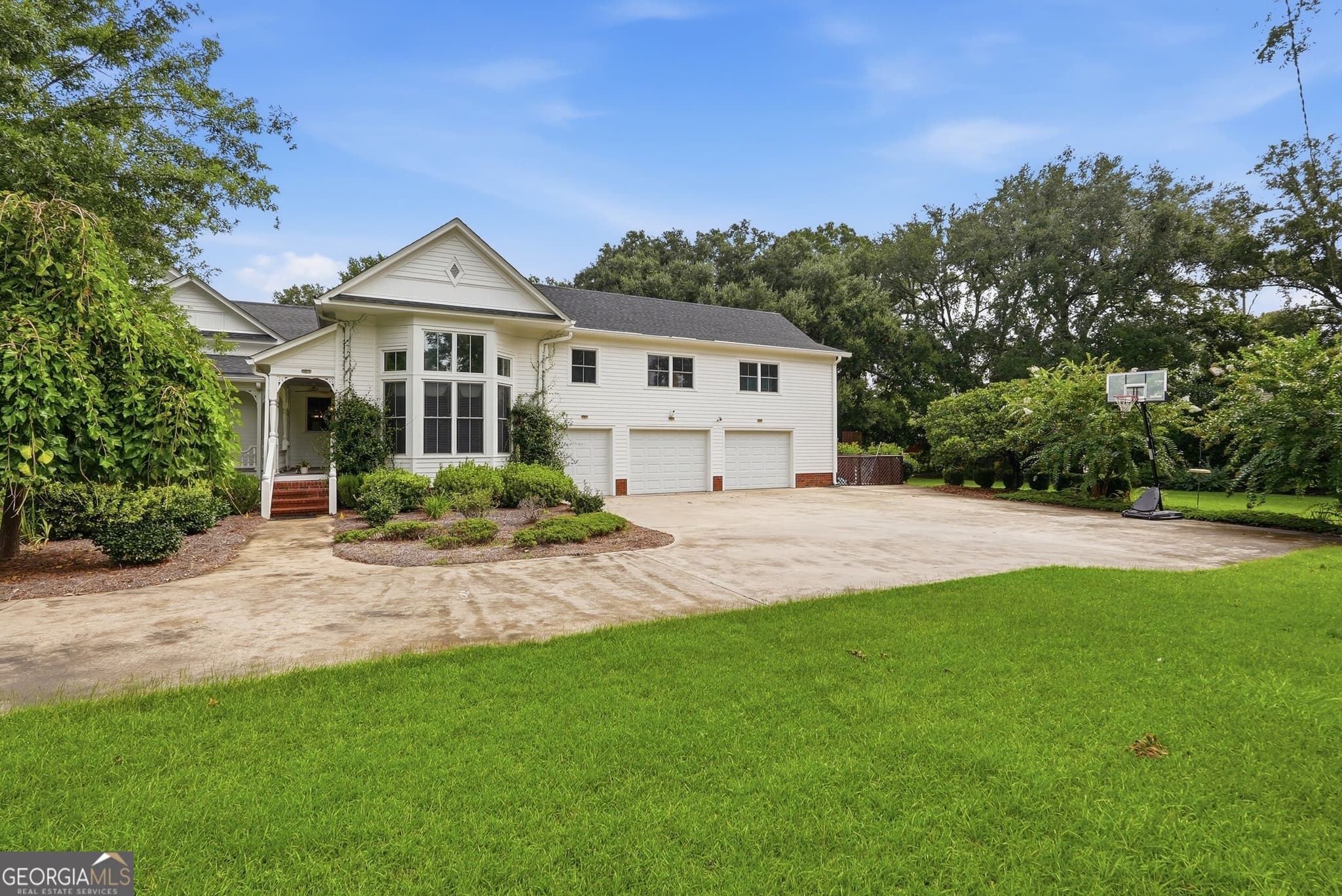 4 bedroom, 3.5 bathroom, 3,948 sq ft single family residence for sale at 309 S College Street, Twin City, GA 30471 — photo 6