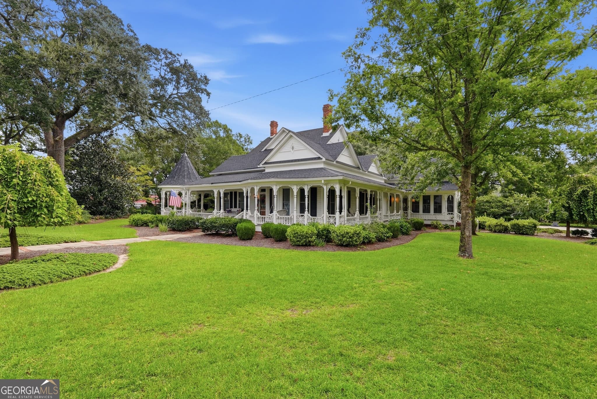 4 bedroom, 3.5 bathroom, 3,948 sq ft single family residence for sale at 309 S College Street, Twin City, GA 30471 — photo 3