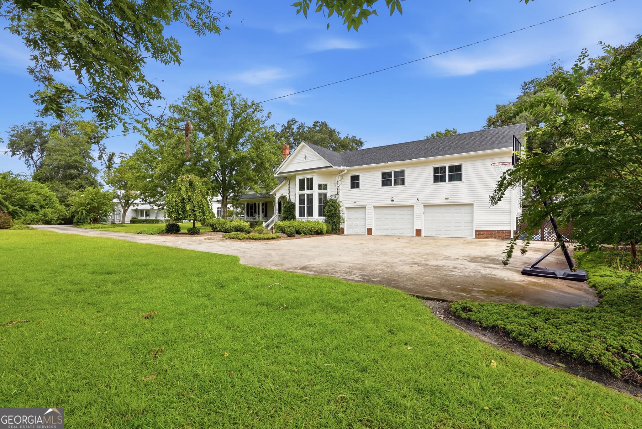 4 bedroom, 3.5 bathroom, 3,948 sq ft single family residence for sale at 309 S College Street, Twin City, GA 30471 — photo 5