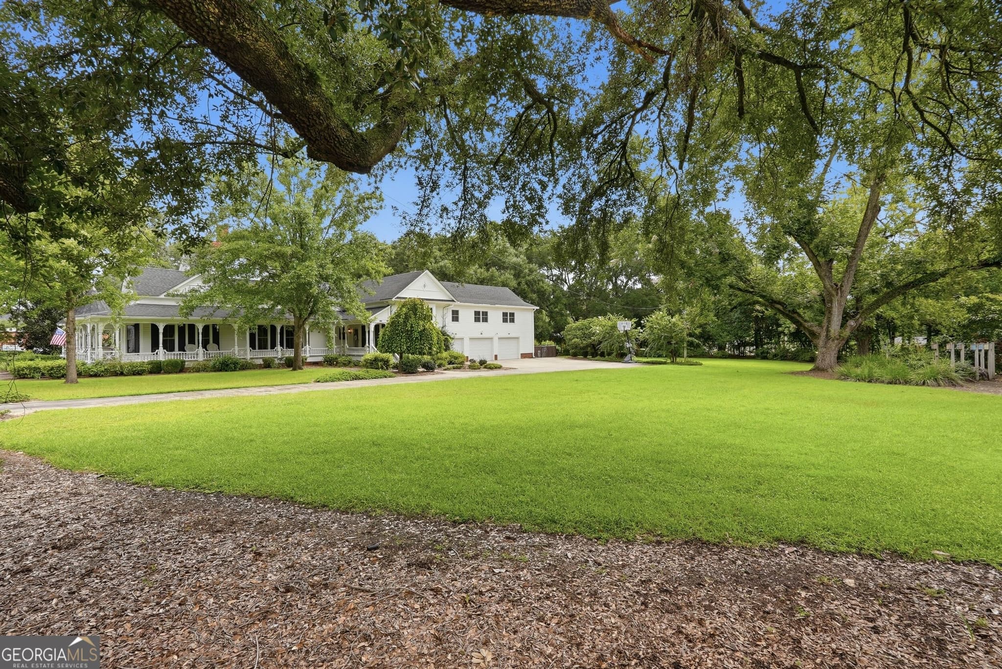 4 bedroom, 3.5 bathroom, 3,948 sq ft single family residence for sale at 309 S College Street, Twin City, GA 30471 — photo 4
