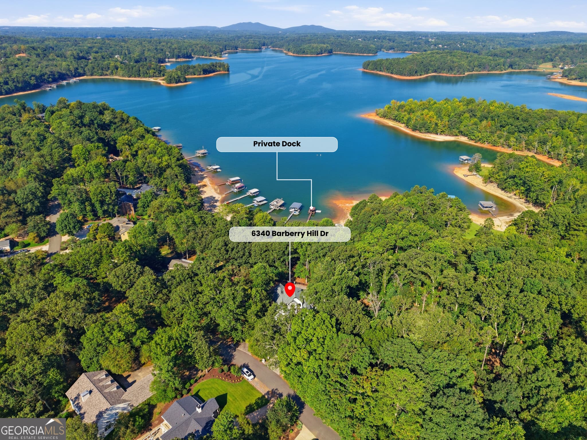 6 bedroom, 4.5 bathroom, 6,188 sq ft single family residence for sale at 6340 Barberry Hill Drive, Gainesville, GA 30506 — photo 2
