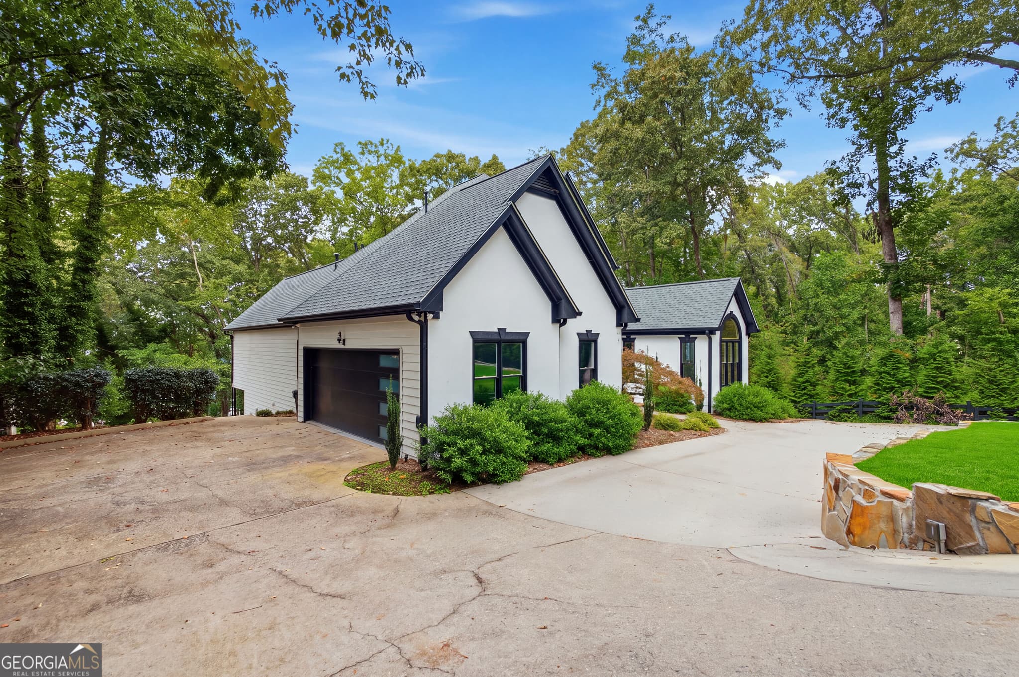 6 bedroom, 4.5 bathroom, 6,188 sq ft single family residence for sale at 6340 Barberry Hill Drive, Gainesville, GA 30506 — photo 5