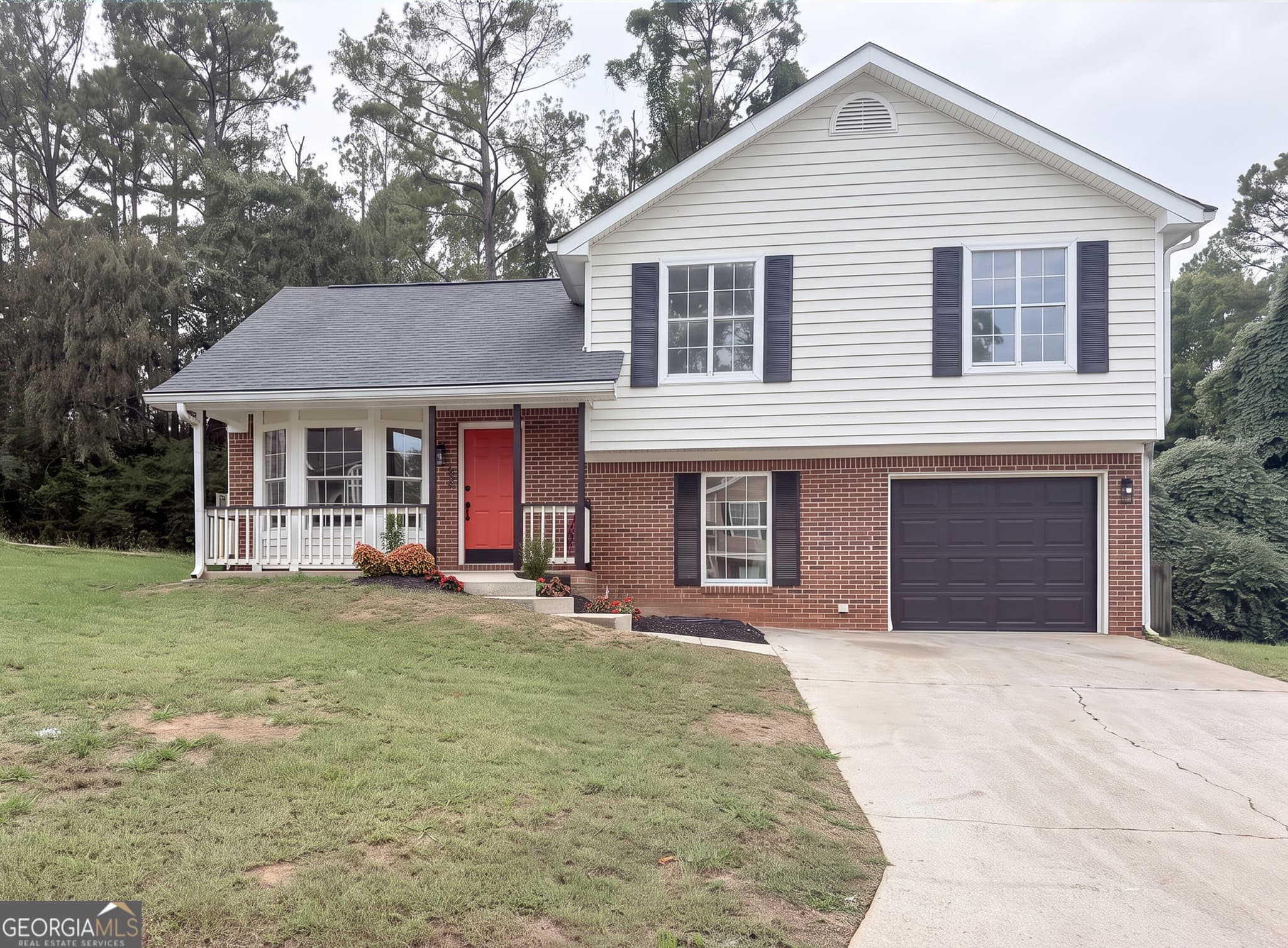 3 bedroom, 2 bathroom, 1,436 sq ft single family residence for sale at 6033 Old Wellborn Trace, Lithonia, GA 30058 — photo 1 of 38
