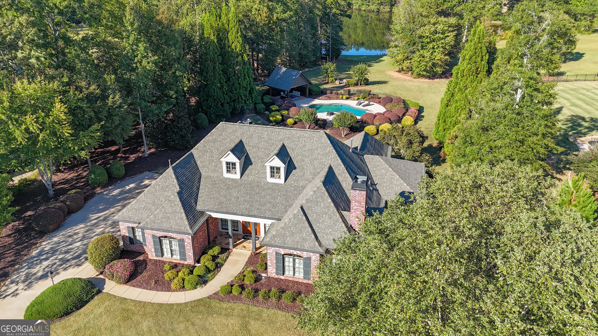 3 bedroom, 3.5 bathroom, 3,979 sq ft single family residence for sale at 323 Beaumont Farms Drive, Sharpsburg, GA 30277 — photo 1 of 102