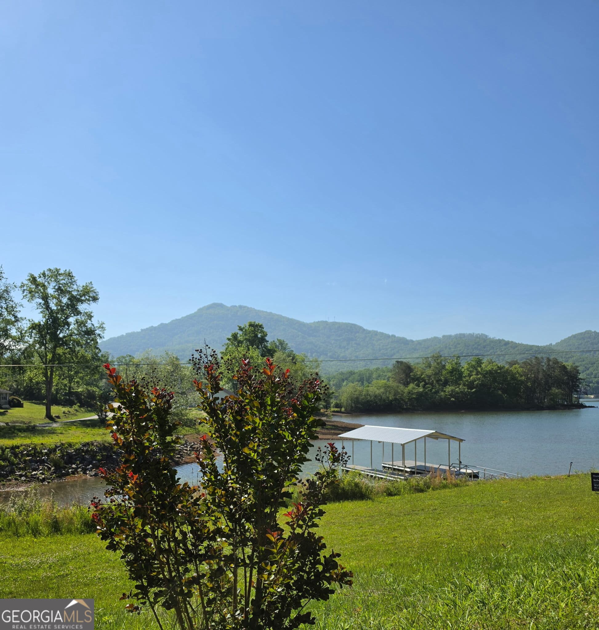 4 bedroom, 3 bathroom, 2,010 sq ft single family residence for sale at 233 Bradshaw Road, Hiawassee, GA 30546 — photo 2
