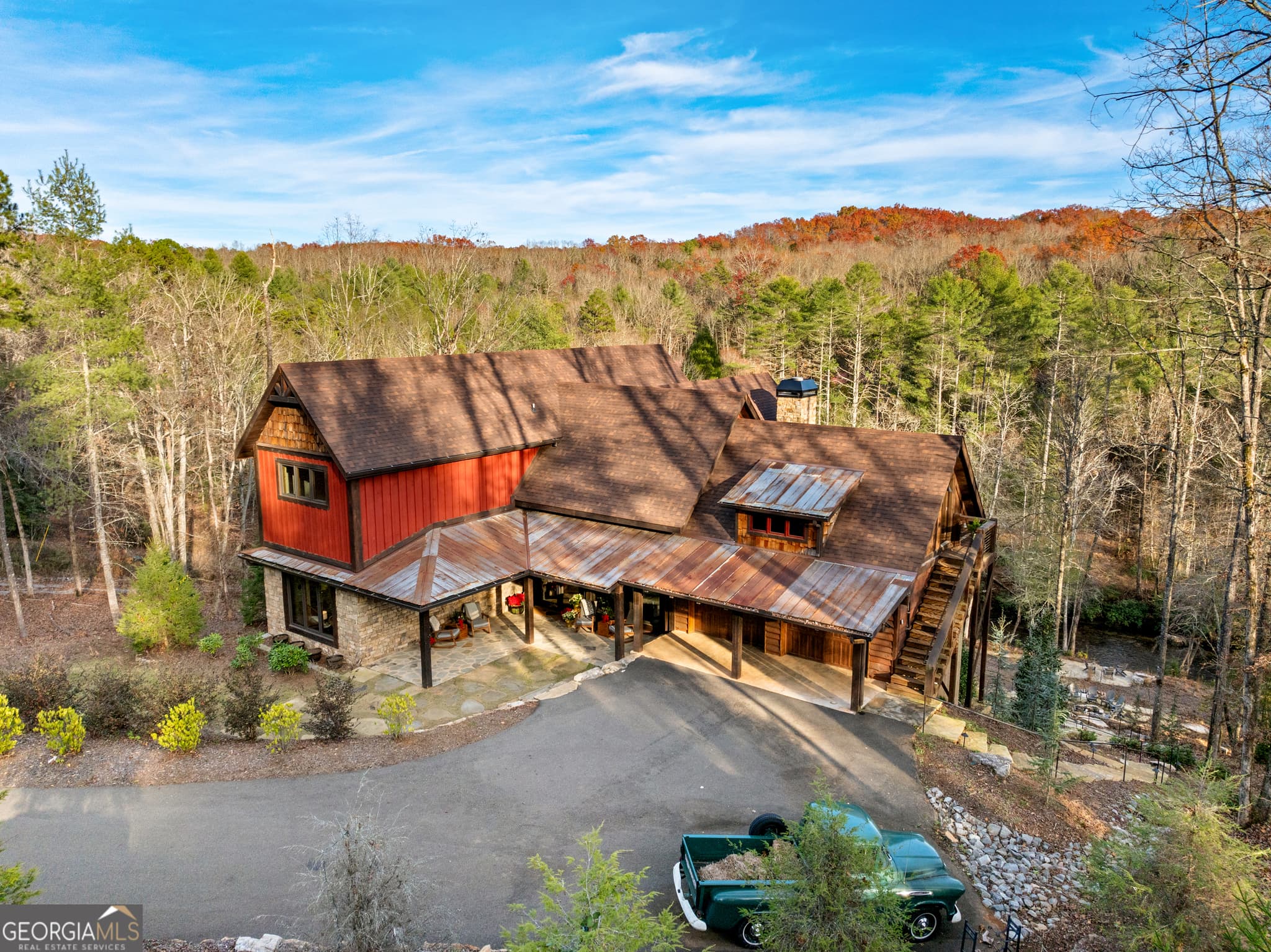 5 bedroom, 5.5 bathroom, 4,716 sq ft cabin,single family residence for sale at 450 Miracle Lane, Blue Ridge, GA 30513 — photo 2