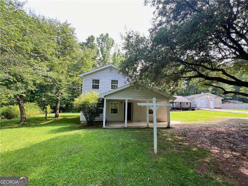 2 bedroom, 1 bathroom, 1,552 sq ft single family residence for sale at 340 Womack Avenue, Dallas, GA 30157 — photo 2