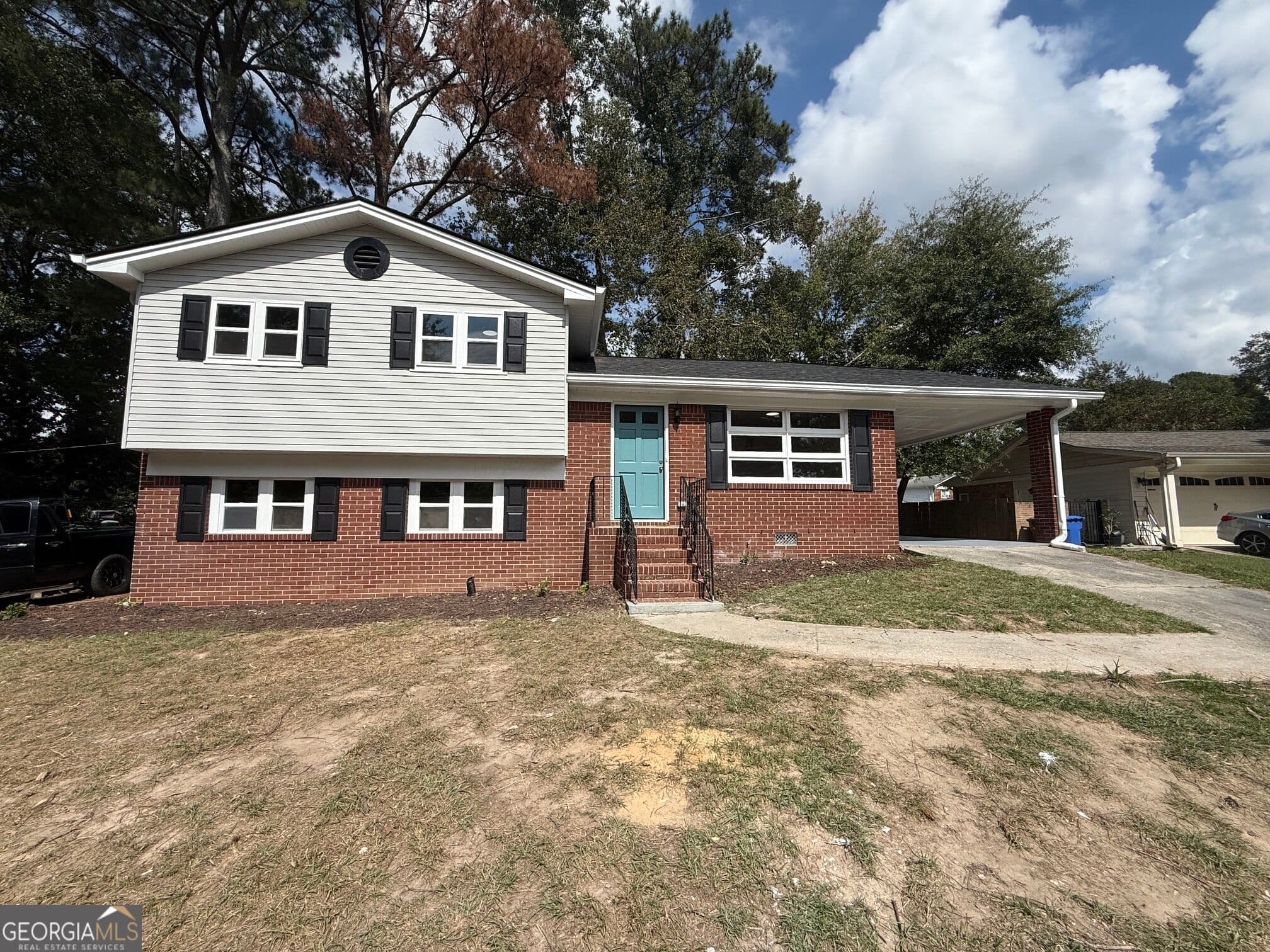 4 bedroom, 2.5 bathroom single family residence for sale at 3229 Vanderbilt Lane, Atlanta, GA 30318 — photo 1 of 28